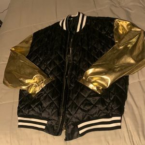 Gold and black bomber jacket.